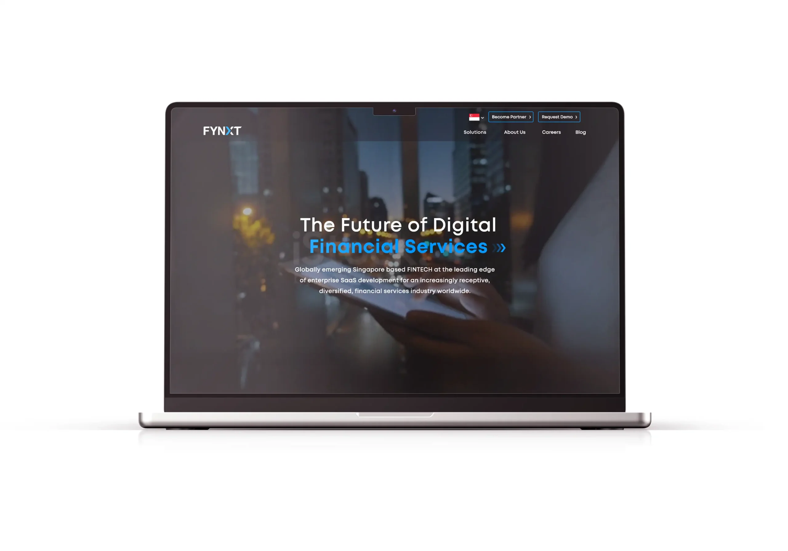 Laptop screen showing the redesigned FYNXT website with a sleek, dark interface featuring the headline "The Future of Digital Financial Services."