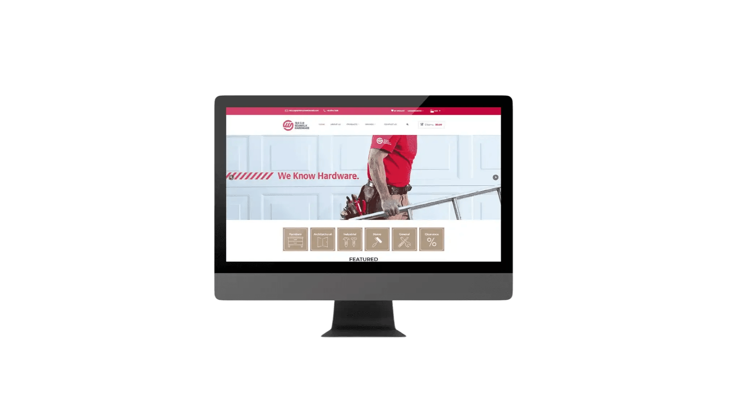 A desktop monitor showing the original Seawalk Hardware website homepage design, featuring a prominent red top banner, a photo of a worker holding a tool bag, and a grid of brown category icons.