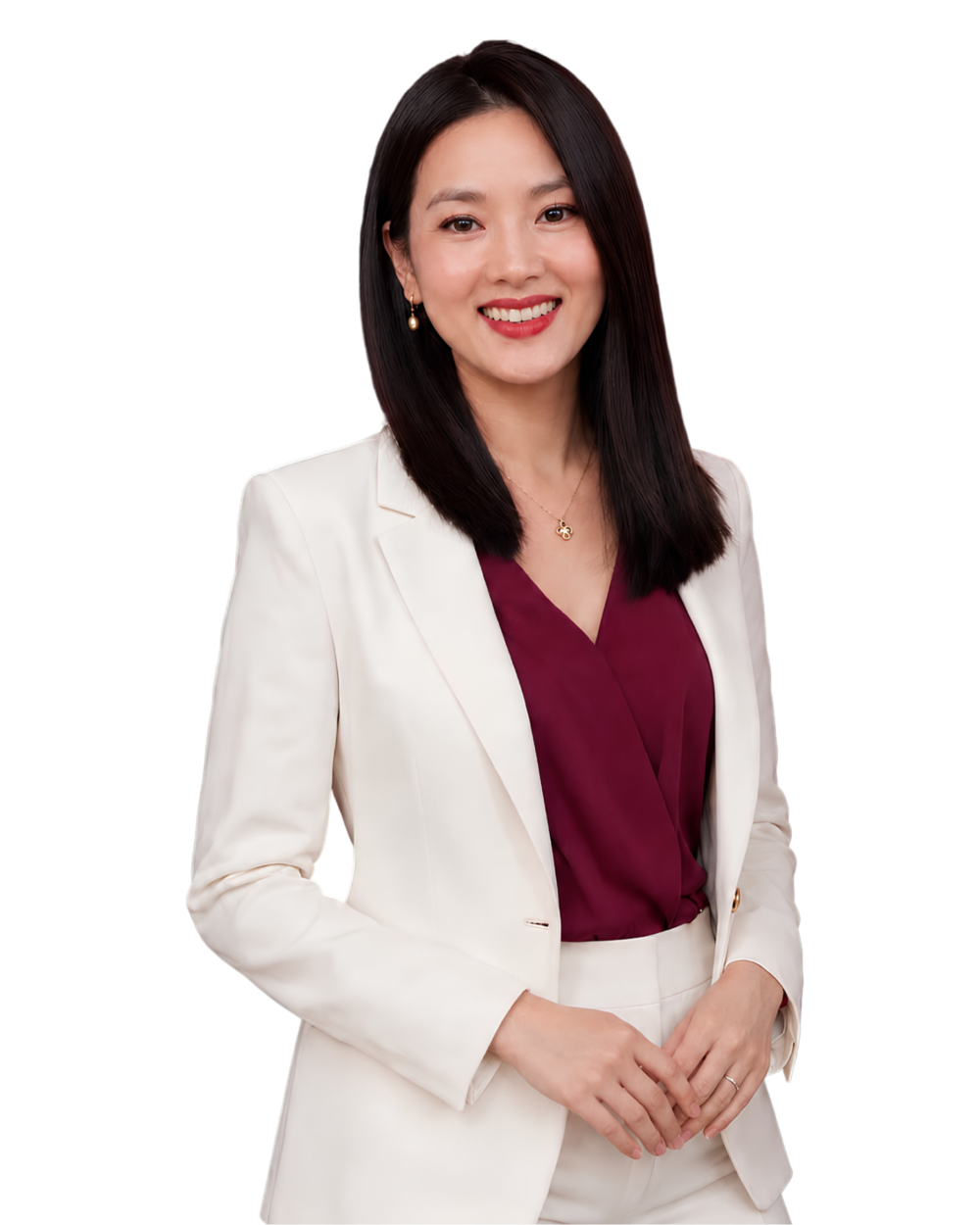 Professional headshot of a smiling woman in a white blazer and burgundy blouse, hands loosely clasped.